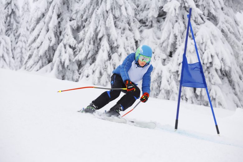 A young downhill skier