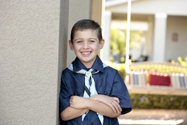 A young scout poses for the camera