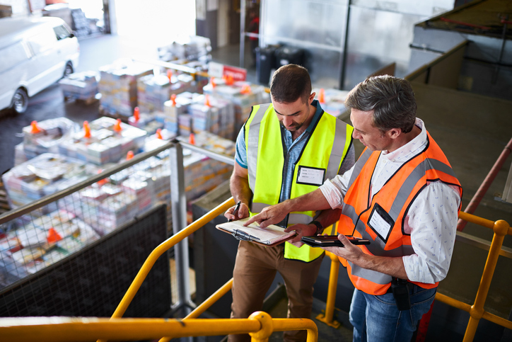 Two men in safety vests