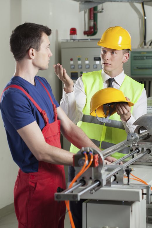 Supervisor telling employee to wear PPE