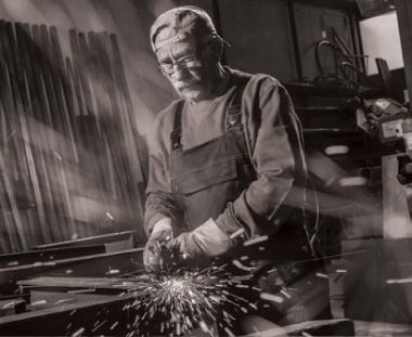 A man operating a grinder