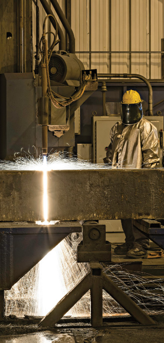 A man operating a cutter