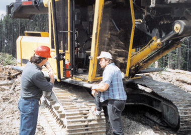 Larry Wilson interviewing a worker