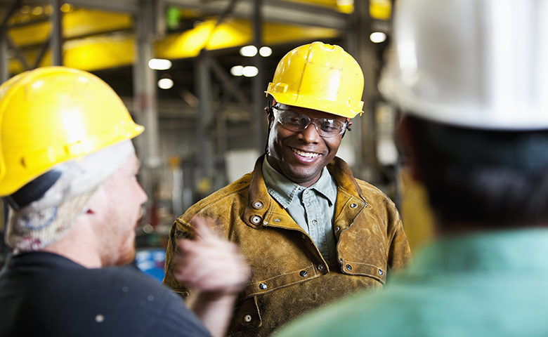 Construction worker happy and engaged at work