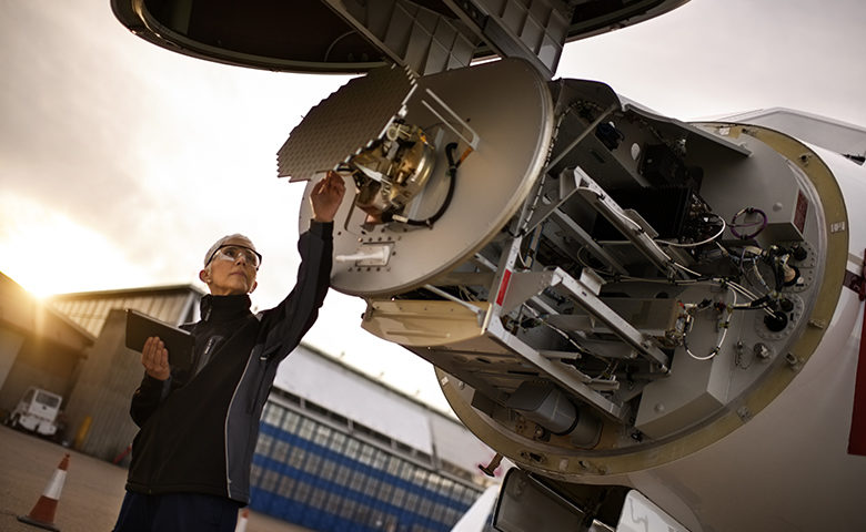 Aircraft mechanic working on an airplane