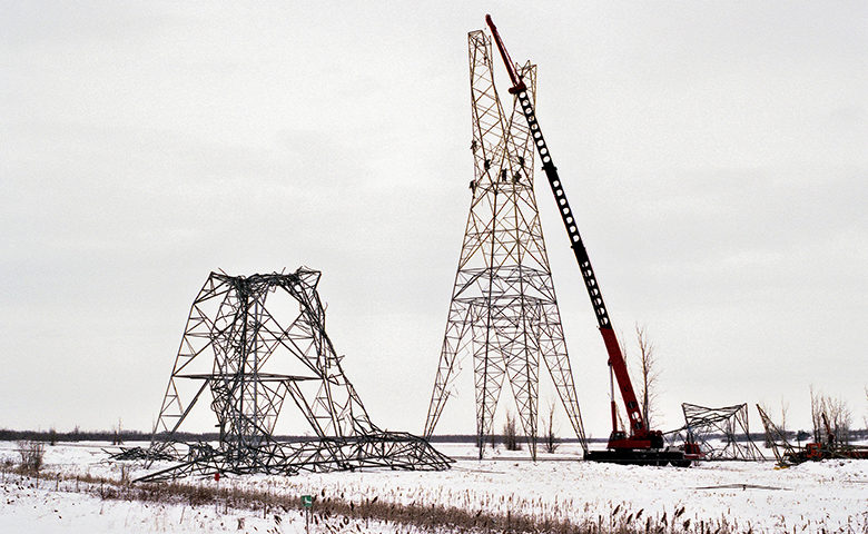 Fallen hydro towers, under reconstruction after the famous 1998 ice storm, in eastern Canada.