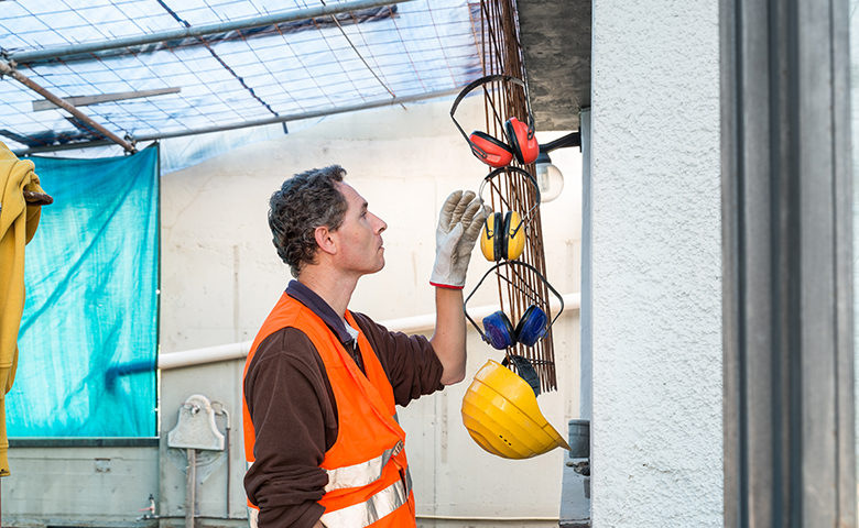 Protective ear muffs. Concept of prevention and safety at work