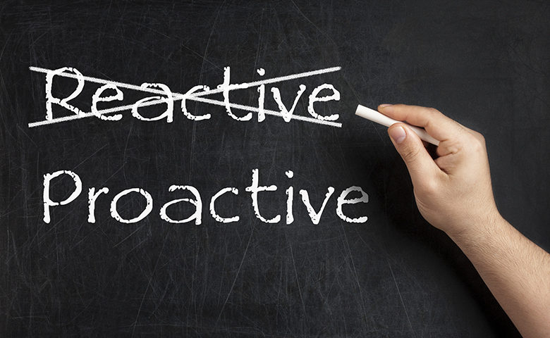 Being Proactive not Reactive crossed blackboard chalkboard