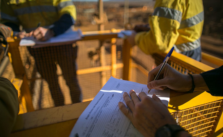 Safety supervisor conducting a site assessment