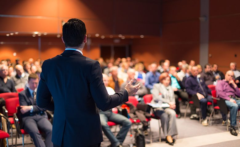 Presenter at a conference