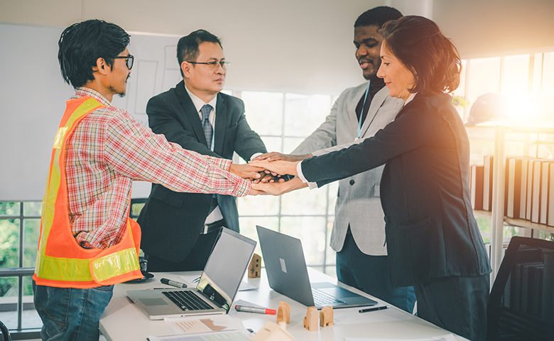 Group huddle good workplace culture