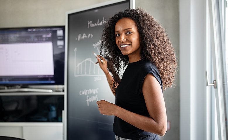 Female professional giving presentation