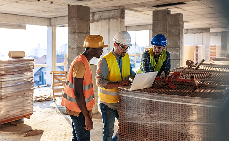 Workers at construction job site inside building