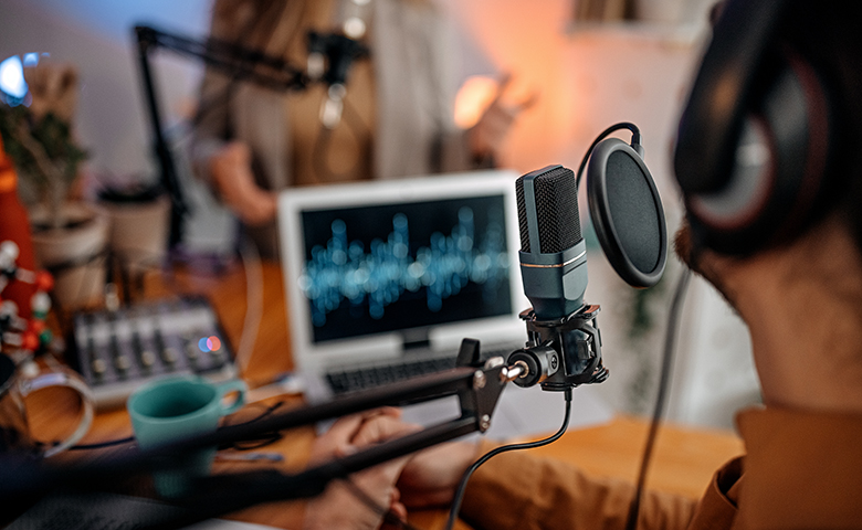 Young people recording podcast in studio