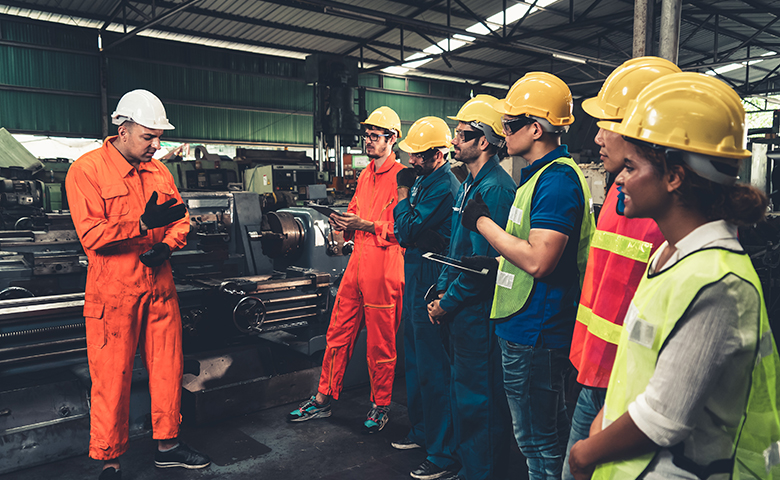 Construction workers attending a safety meeting