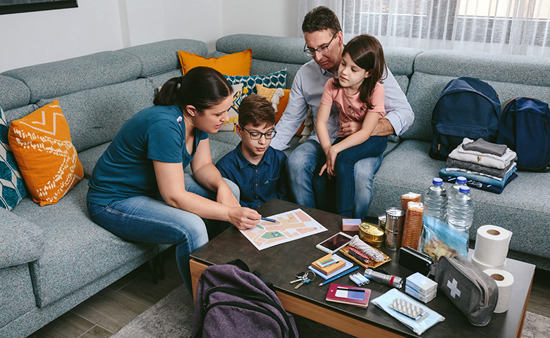 Mother explaining to her family the emergency assembly point